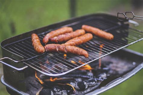 Sausage on a bbq grill. | Free Photo - rawpixel