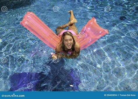 Teen Girl In Pink Bikini On A Float Stock Photo Image Of Happy