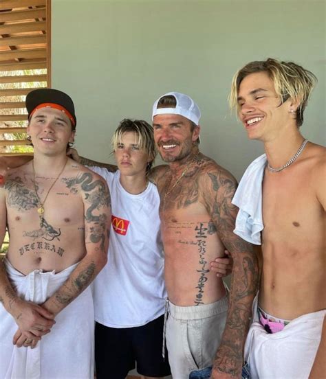 David Beckham Shows Off His Incredible Abs In Holiday Snap With Sons