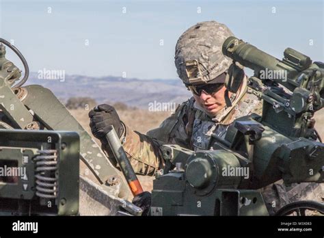 Soldiers Of A Battery 1 37 Field Artillery Hone Their Artillery