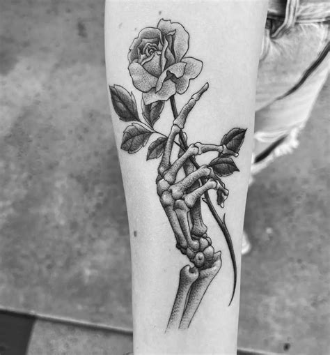 61 Skeleton Hand Tattoo Ideas With Deep Meanings