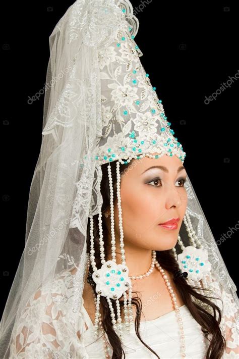 Beautiful Woman In The Kazakh National Wedding White Dress On A Black