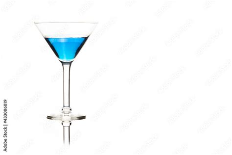 Martini glasses isolated on white with blue drink in one glass Stock ...