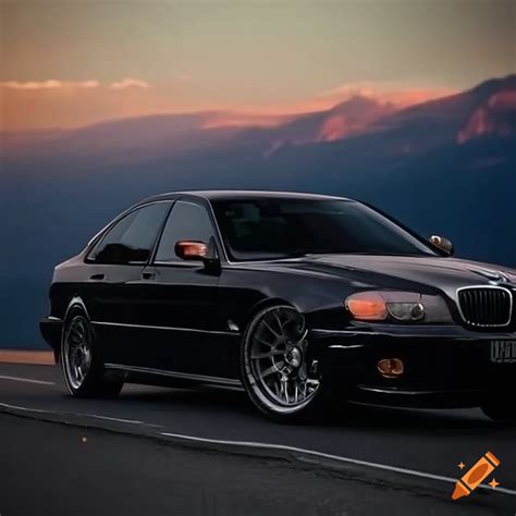 Sleek Black Bmw E39 Car On A Scenic Road On Craiyon