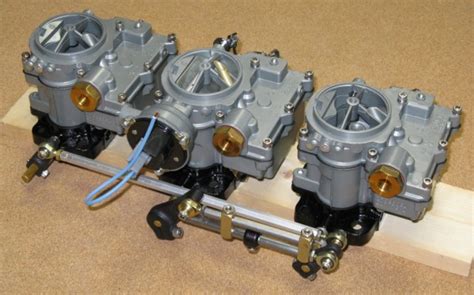 N O S New Rochester Tri Power Carbs Carburetors Electric Choke Splined