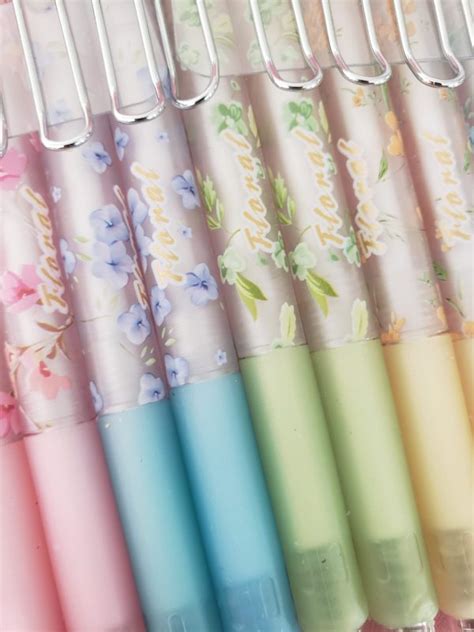 PACK 12 PLUMAS KAWAII CONEJO FLORES RETRACTIL PUNTO FINO 05mm GEL