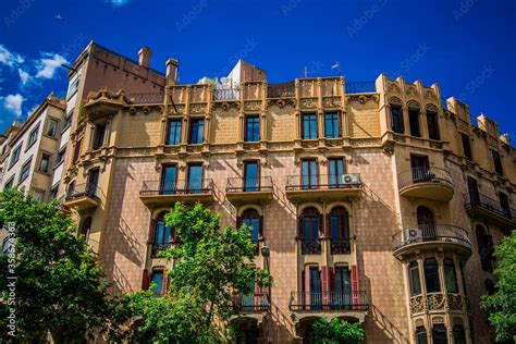 beautiful facades of traditional old historic spanish houses, windows ...