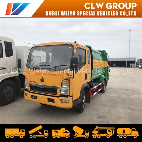 Sinotruk Howo Cbm X Right Hand Drive Compactor Garbage Truck Trash