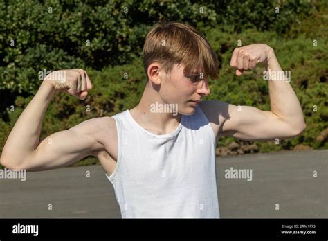 Muscular teen biceps hi-res stock photography and images - Alamy