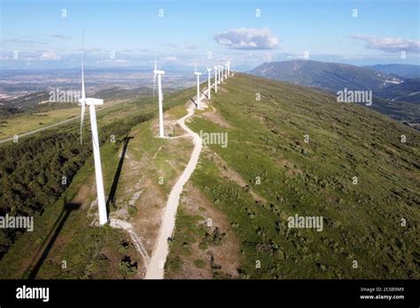 Aerial View Of Windmills Farm For Renewable Energy Production On