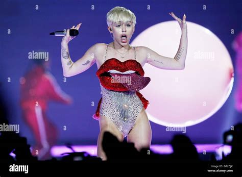 Miley Cyrus concert - London. Miley Cyrus performs in concert at the O2 Arena, London, on the UK ...