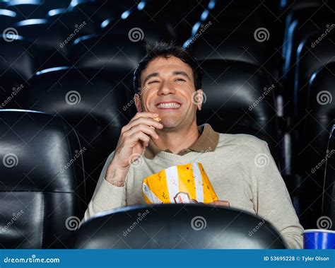 Happy Man Watching Movie In Theater Stock Photo Image Of Laugh