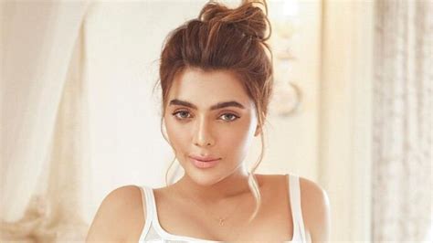 Actress Model Ruhi Singh Stuns In Hot Denim Shorts White Crop Top Bollywood