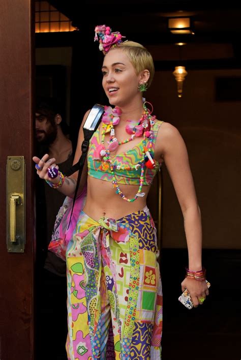 Miley Cyrus wears a colorful outfit - Mirror Online