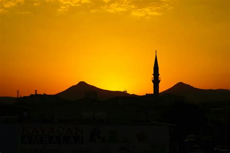 Stunning Sunset Over Konya Mosque SilhouetteFree Stock Photo
