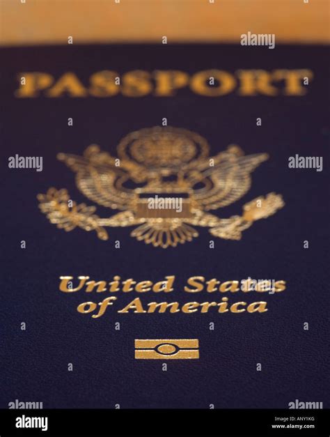 New American Passport With Electronic Chip Inserted Showing The Electronic Passport Logo At The