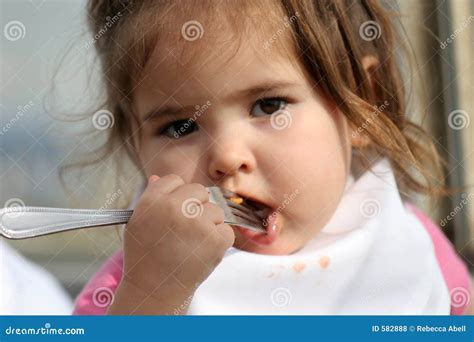 Big Bite stock photo. Image of toddlers, eyes, childhood - 582888