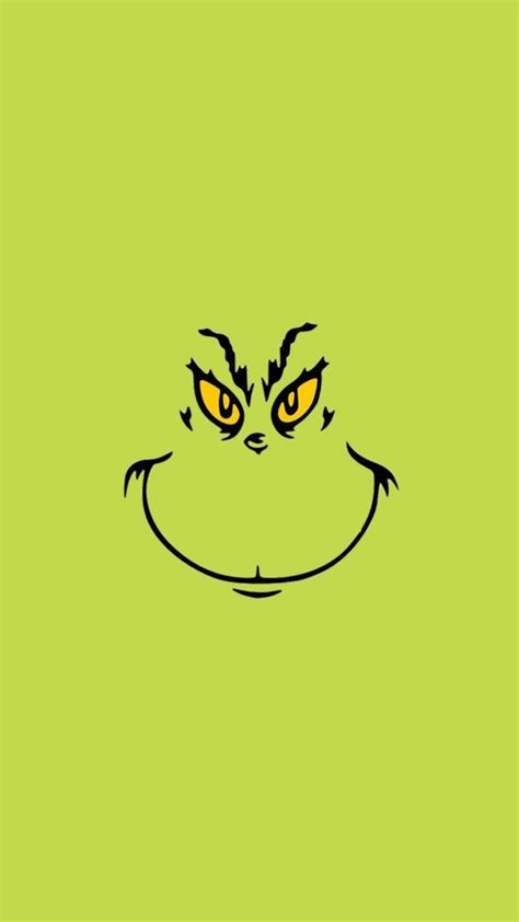 The Grin Face Is Drawn On A Green Background