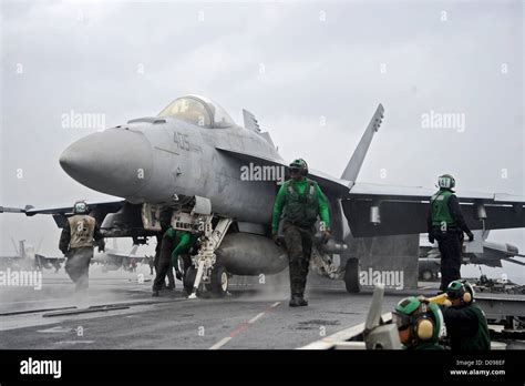 Sailors Aboard The Aircraft Carrier Uss George Washington Cvn