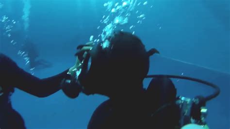 Female Diver With Latex Suit And A Gas Mask Underwater Frogwoman Org