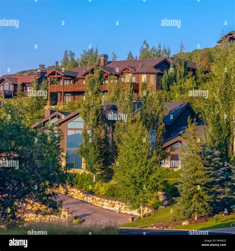 Luxury homes with sunset lighting Park City square Stock Photo - Alamy