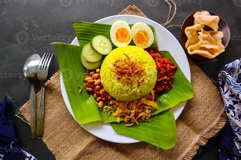 Nasi Kuning Or Yellow Rice Or Tumeric Rice Is Traditional Food From