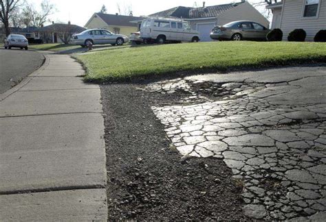 Carpentersville rethinking driveway repaving