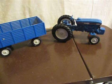 Ertl Ford Tractor and Wagon Vintage Blue toy | Etsy | Ford tractors ...