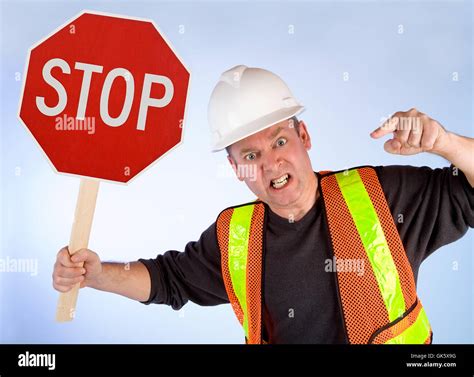 Man Holding Stop Signal Hi Res Stock Photography And Images Alamy