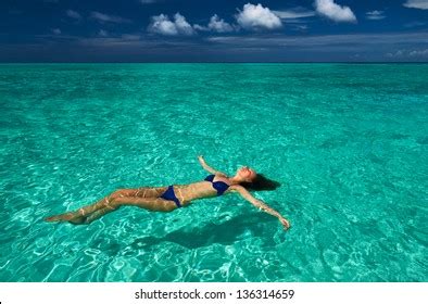 Woman Bikini Lying On Water Tropical Stock Photo Edit Now 136314659