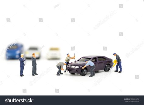 Miniature Mechanics Repairing Toy Carconcept Workshop Stock Photo