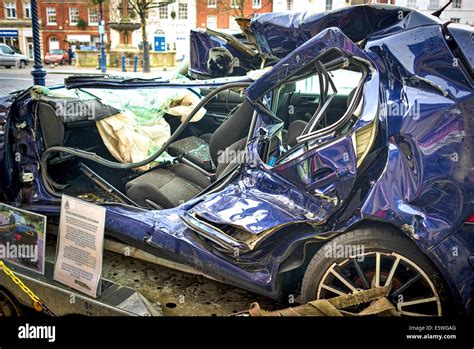 Remains Of A Volkswagen Golf Car After A Collision On A Motorway At