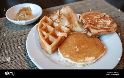 Crepe Waffle French Toast Pancake And Honey Stock Photo Alamy