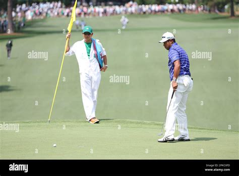 Japans Hideki Matsuyama And His Caddie Shota Hayafuji On The 7th Hole