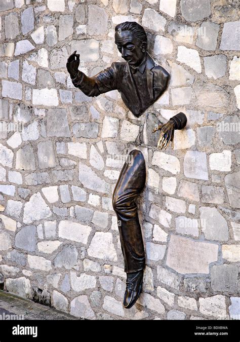 The Statue Le Passe Muraille At Montmartre Paris France Stock Photo