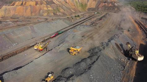 Iron Ore Quarry Open Pit Mining Aerial View Of Excavators And