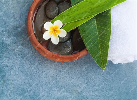 Premium Photo Top View Of Spa Objects And Stones For Massage Relax Room On Blue Background