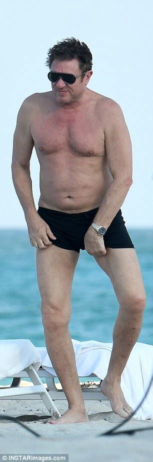 Simon Le Bon Hits Beach In Miami With Mystery Female Daily Mail Online