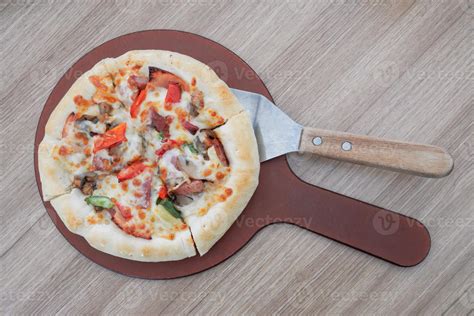 One pan pizza is divided into 4 slices which are smaller than other