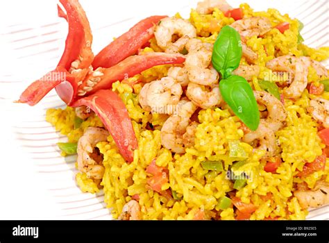 Curried rice with prawns Stock Photo - Alamy