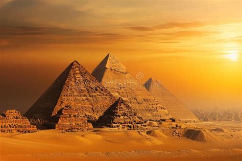 A Stunning Photograph Of A Collection Of Pyramids Towering Over The