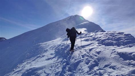 Solo Hiker Walking In The Mountains On A Very Windy Sunny Day Outdoor