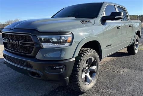 A Gray Ram Truck Parked In A Parking Lot