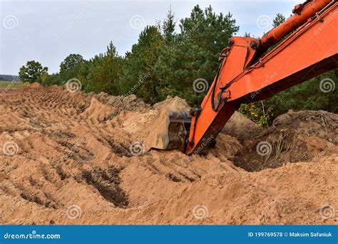 Excavator Bucket For Digging A Pit And Ditch At Construction Site