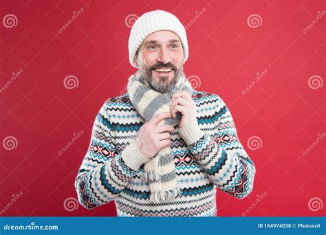 Cold Winter Conditions Handsome Bearded Guy Wearing Hat And Scarf Red