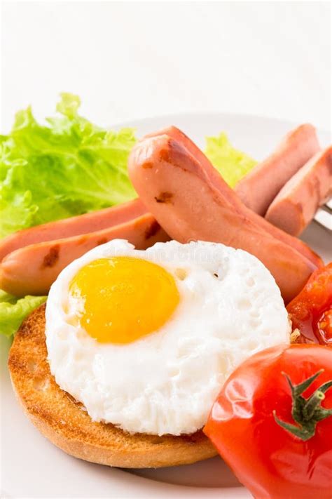 Fried Egg Roast Sausages And Toast Stock Photo Image Of Green