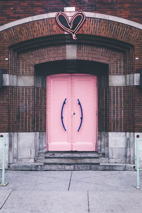 Browse Free Hd Images Of Pink Church Doors With Neon Hard Above