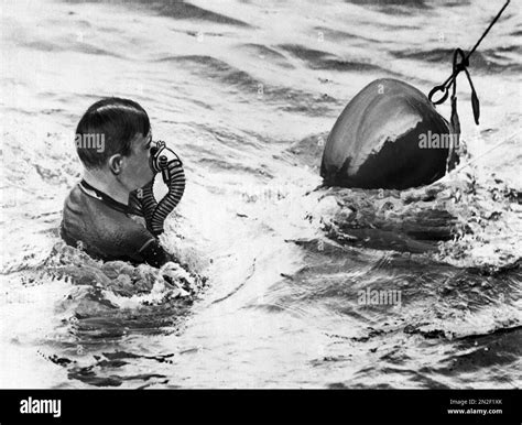 Lieutenant Commander C B Momsen Is Pictured With His Submarine Rescue