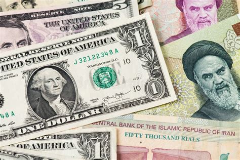Iran Rial Currency and US Dollar Banknotes Close Up Image.. USD IRR Oil ...