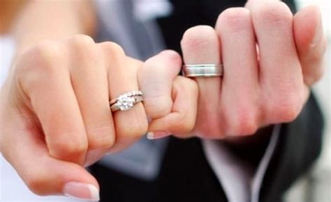 Engagement Ring Holding Hands